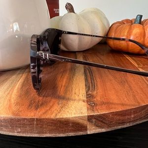 Blenders eyewear. Frame is a black/blue color.